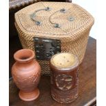 A Chinese hexagonal wicker tea basket, with ceramic tea bowls and teapot, a carved bamboo box and