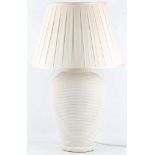 A modern pottery Ralph Lauren table lamp, of coil rope form decoration, with pleated cream shade,