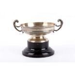 An Edwardian antique sterling silver twin handled pedestal bowl on wooden stand, Birmingham 1909