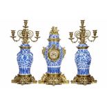 A LARGE LATE 19TH CENTURY FRENCH PORCELAIN AND GILT BRONZE MOUNTED CLOCK GARNITURE IN THE ORIENTAL