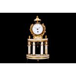 AN EARLY 19TH CENTURY ENGLISH GILT BRONZE AND WHITE MARBLE PORTICO CLOCK BY THOMAS HAWLEY, LONDON