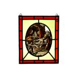 A 16TH CENTURY SWISS STAINED GLASS PANEL DEPICTING THE ENTOMBMENT of oval form, the body of Christ