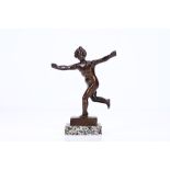 MANNER OF BARTHELEMY PRIEUR (FRENCH, 1540-1611): A SMALL 17TH CENTURY BRONZE STATUETTE OF CUPID