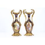 A VERY FINE PAIR OF LATE 19TH CENTURY SEVRES STYLE PORCELAIN AND GILT BRONZE MOUNTED URNS / VASES BY