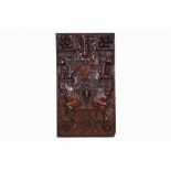A 17TH CENTURY NORTH EUROPEAN CARVED WALNUT RELIEF PANEL  of rectangular form, depicting a pair of