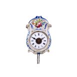 A SMALL 19TH CENTURY GERMAN PORCELAIN WALL ALARM CLOCK the case with floral decoration within C