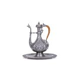 JULES BRATEAU (FRENCH, 1844-1923): A PEWTER AND STRAW EWER AND BASIN CIRCA 1889 in the Ottoman