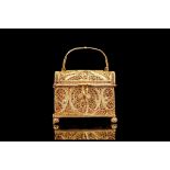 A SMALL SILVER GILT FILIGREE CASKET, POSSIBLY GOA 17TH CENTURY with a swing handle over a domed,