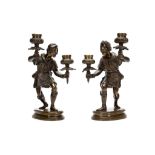 A PAIR OF MID 19TH CENTURY BRONZE FIGURAL CANDLESTICKS IN THE GERMAN RENAISSANCE MANNER each