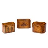 A COLLECTION OF THREE GEORGE III SATINWOOD AND MARQUETRY INLAID TEA CADDIES all of similar