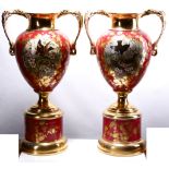 A PAIR OF EARLY 20TH CENTURY CONTINENTAL PORCELAIN VASES of baluster from with twin dragon