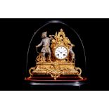A LATE 19TH CENTURY FRENCH GILT METAL FIGURAL MANTEL CLOCK UNDER GLASS DOME the clock surmounted