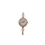 LADIES VINTAGE ROLEX WRISTWATCH  A ladies vintage 9ct gold Rolex wristwatch, with signed silvered