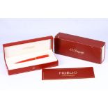 DUPONT FIDÉLIO PEN A Dupont Fidélio ball point pen, presented in the coral finish option with gold