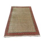A Persian Qum carpet, Central Iran, 3.23m x 2.32m, condition rating A.