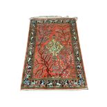 A fine silk Persian Qum rug, 2.02m x 1.32m, condition rating A.