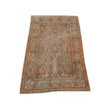 An early 20th Century Persian Isfahan rug with tree of life design, 2.10m x 1.40m, condition