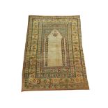 An antique silk Turkish Kayseri rug, 1.57m x 1.05m, condition rating C.