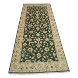 An Afghan Ziegler carpet, 4.20m x 1.88m, condition rating A.