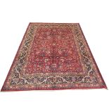 A signed Persian Meshed carpet, North East Iran, 3.90m x 3.08m, condition rating B