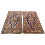 A pair of 1930's Persian Keshan rugs, 2.08m x 1.32m & 2.06m x 1.32m, condition rating B.