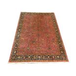 An early to mid 20th Century Persian Tabriz carpet, 2.98m x 2.17m, condition rating B.