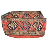 An early 20th Century Persian Shahsavan cradle, 1.00m x 0.60m, condition rating B.