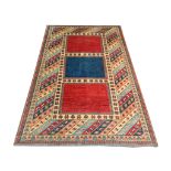 An Afghan Kazak carpet, 3.08m x 2.07m, condition rating A.