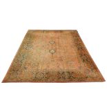 An early 20th Century Turkish Ushak carpet, 3.56m x 3.07m, condition rating B/C.