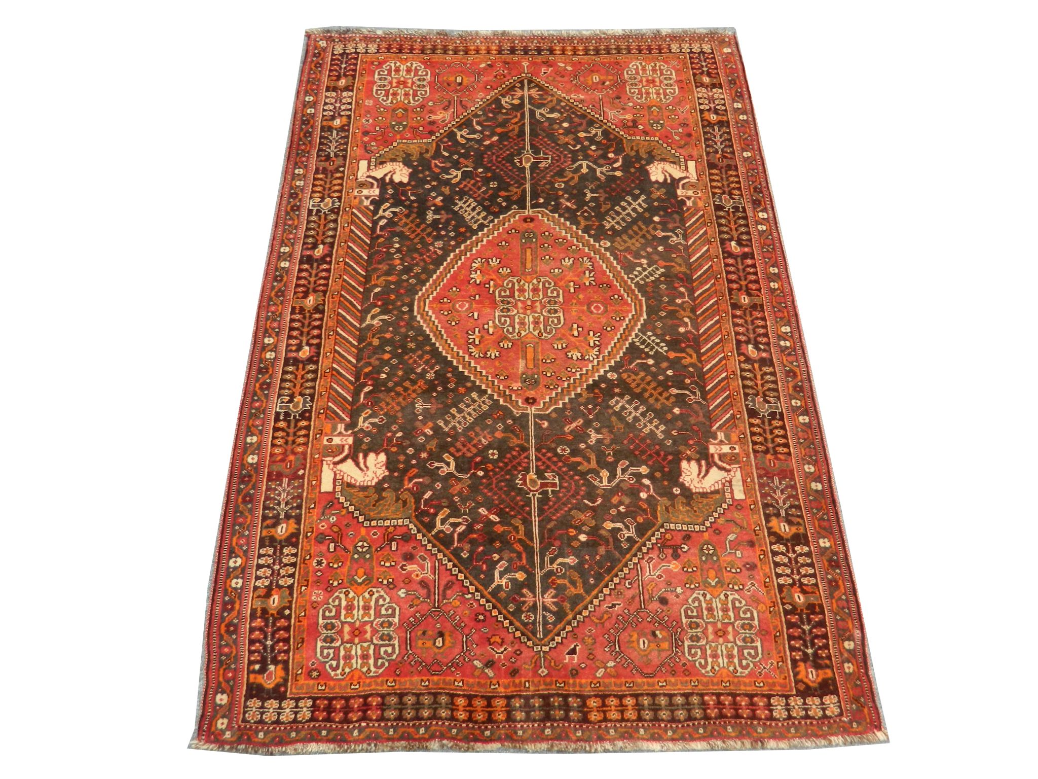 A Persian Qashqai carpet, South West Iran, 2.37m x 1.56m, condition rating A.