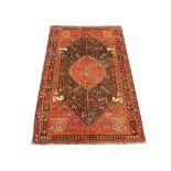 A Persian Qashqai carpet, South West Iran, 2.37m x 1.56m, condition rating A.