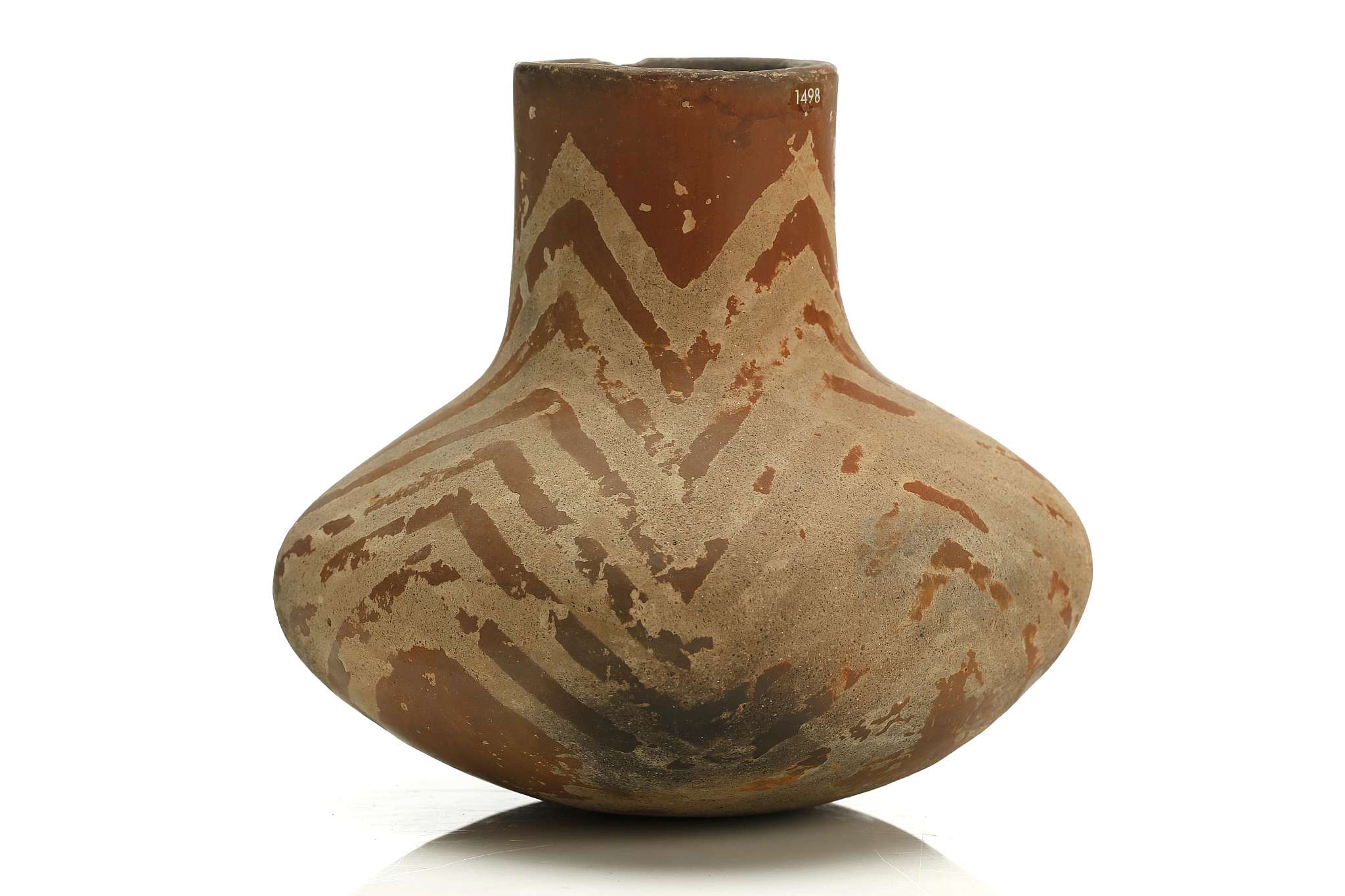 AN ANATOLIAN POTTERY VESSEL Hacilar Region, Middle Chalcolithic, circa 5000 B.C. With cylindrical