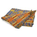 A KENTE CLOTH, GHANA With predominantly blue background, composed of a chequered design with