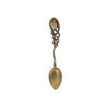 A STEATITE SCARAB MOUNTED INTO A SPOON The scarab carved naturalistically, mounted into the handle