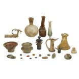 A LARGE GROUP OF GLASS ITEMS Roman to Islamic Period and later Including a Roman red opaque glass