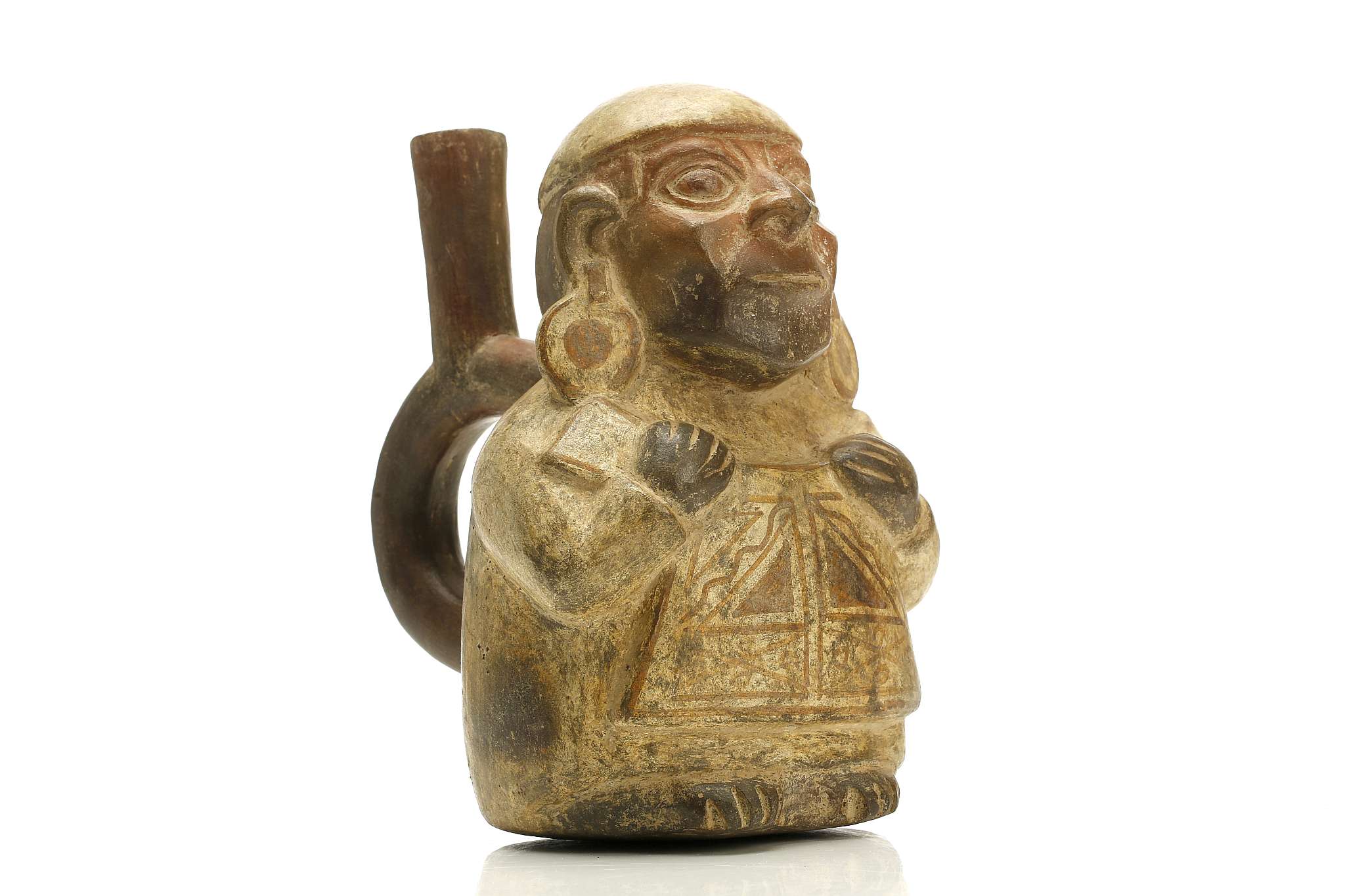 A MOCHE POTTERY FIGURAL VESSEL Depicted as a standing figure, with details added in paint, wearing a