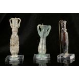 TWO ROMAN GLASS VESSELS AND A BYZANTINE GLASS VESSEL 1st-4th Century A.D. Including two Roman pale