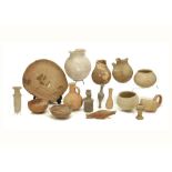 A LARGE GROUP OF ANCIENT POTTERY VESSELS Including an Egyptian terracotta offering table, 28cm wide,