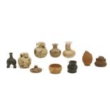 A GROUP OF SMALL ANCIENT VESSELS Including a Near Eastern alabaster vessel with stone inlays