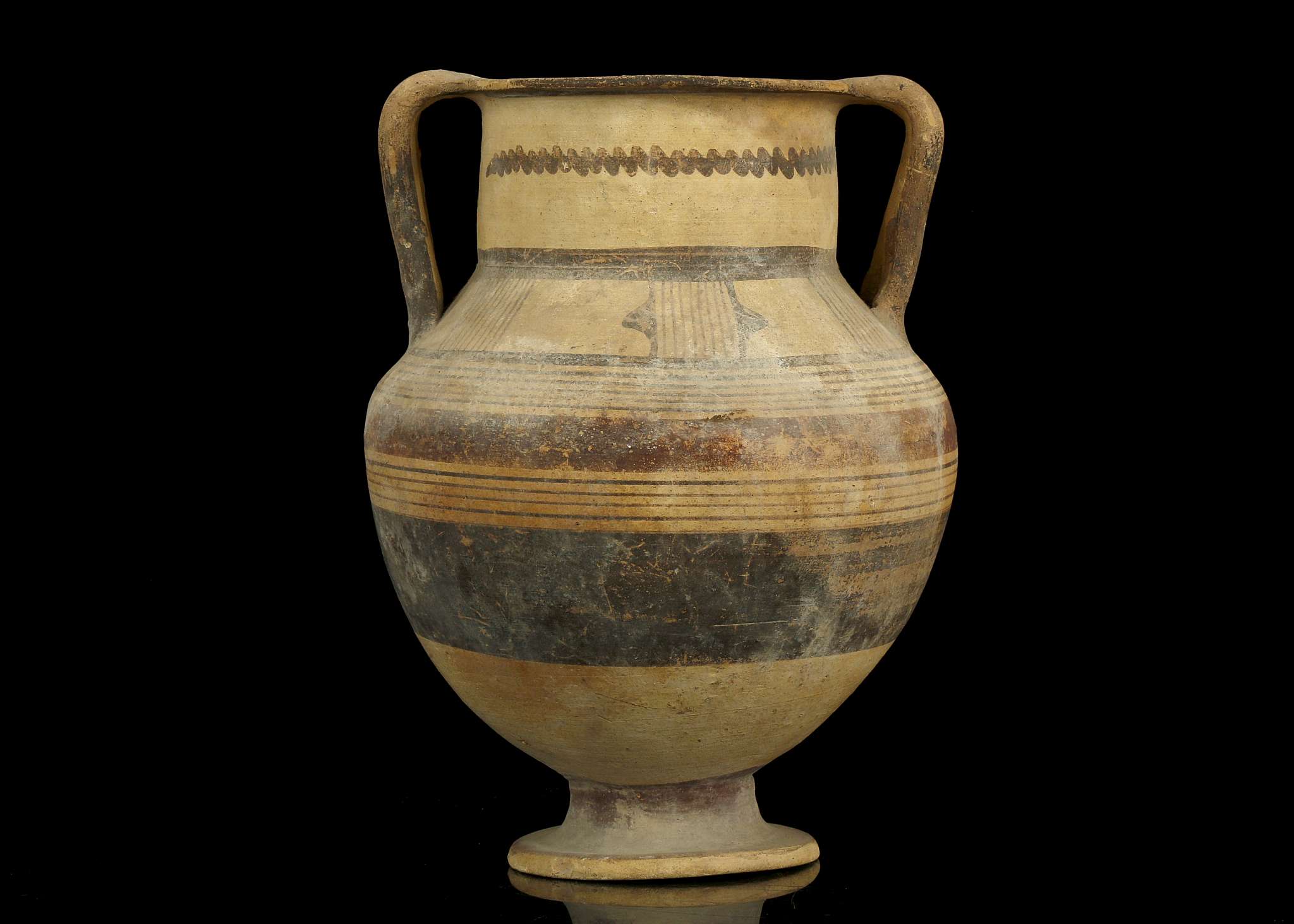 A CYPRIOT AMPHORA Iron Age, 8th Century B.C. Bichrome ware stemmed amphora, decorated with geometric