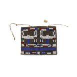 AN AFRICAN BEADED APRON Of geometric design, made of red, blue, white, green and purple beads,