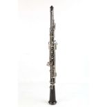An English oboe , made by and stamped Howarth London. Ebony body, with silver plated keys. In very