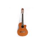 An electric classic guitar, labelled, Guitarras Almansa, model no. CTW.-435 ELE. No. 14000163. The