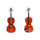 Three student violins. Two full sized and a three quarter.