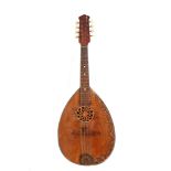 An early 20th century semi-round backed mandolin, decorated with hand painted flower motifs. Star