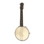 A ukulele banjo , probably by John Grey, wooden body with a metal resonator, circa 1930s. In a
