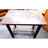 A rectangular oak side table, on square legs with 'H' stretcher, 87cm. (Constructed from old