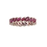 A ruby eternity ring Set with a continuous line of marquise-cut rubies, ring size M