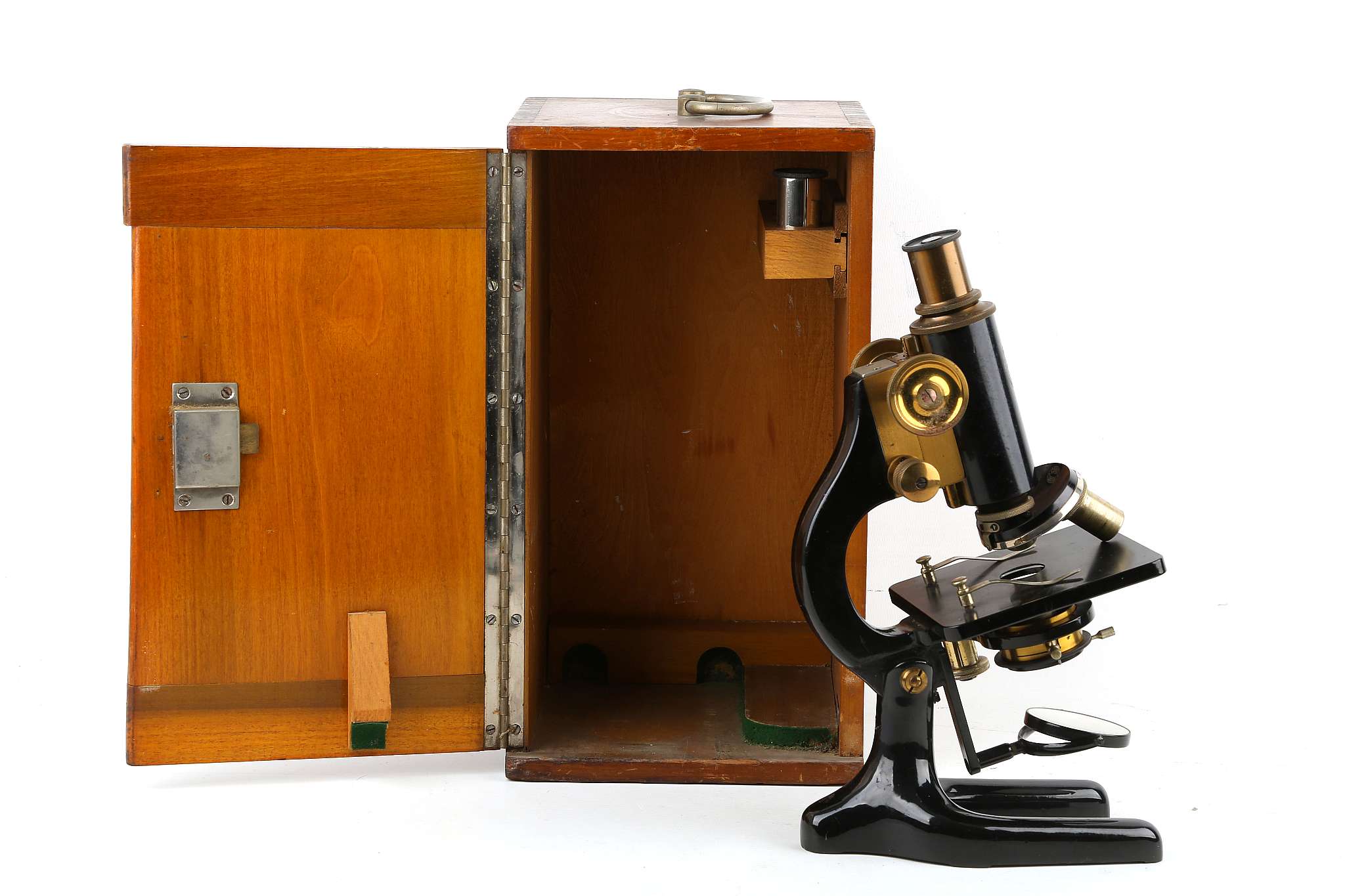 An early 20th Century, black lacquered brass monocular microscope, the tube with focus adjustment