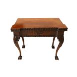 A George II style Irish mahogany folding card table, the baize lined interior with counter wells